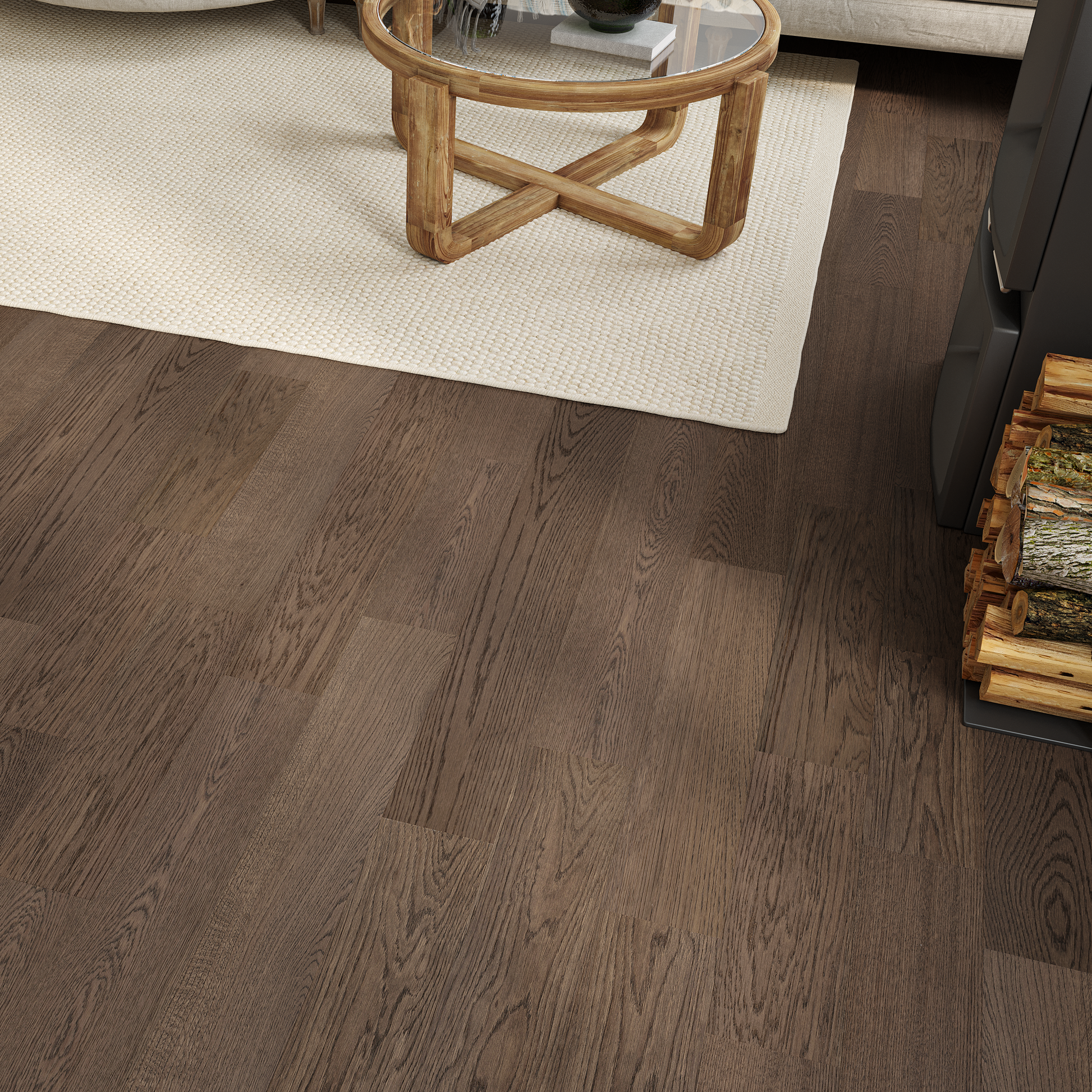 Wooden flooring with a rug and small table in the background