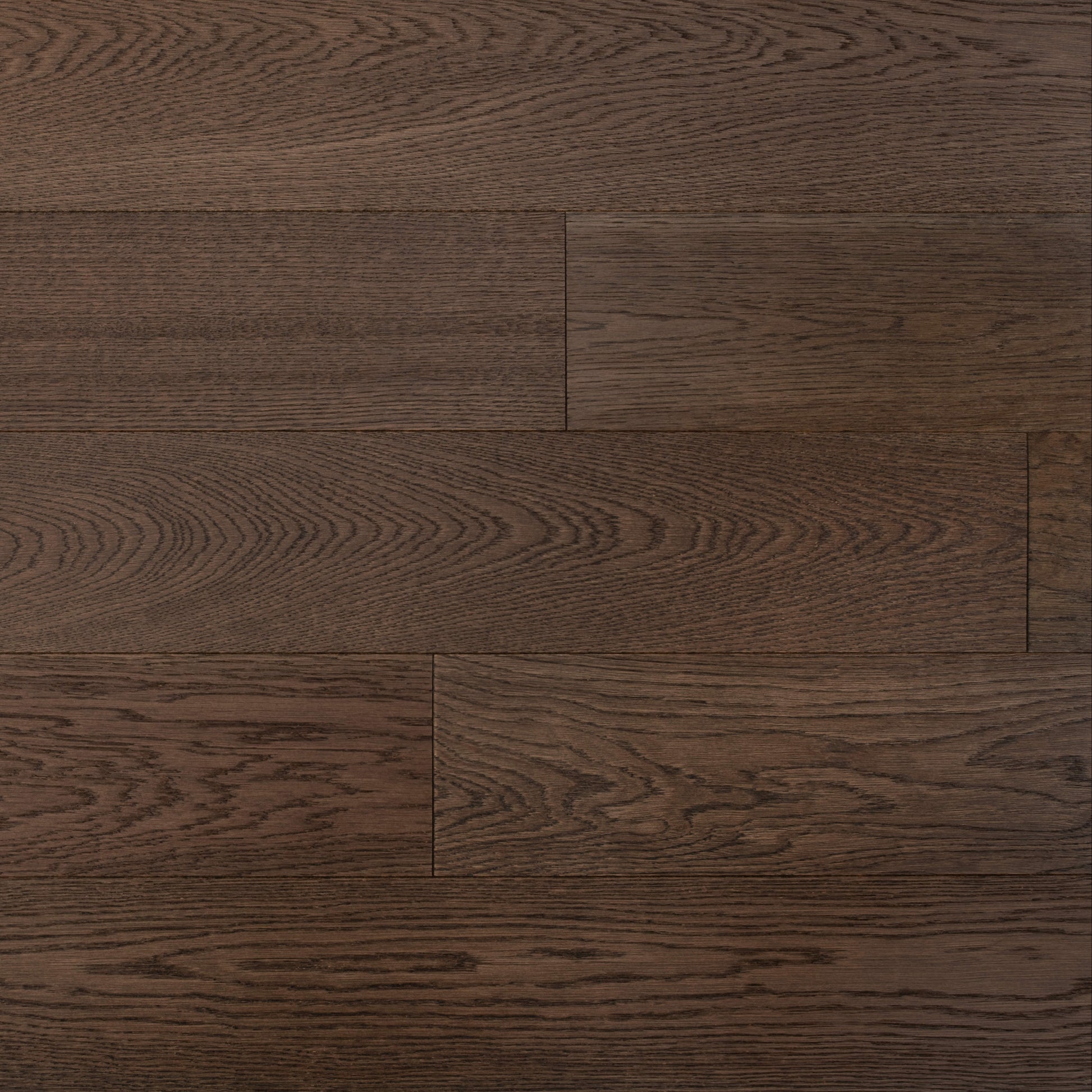 Close-up of dark brown wooden flooring with visible grain and texture