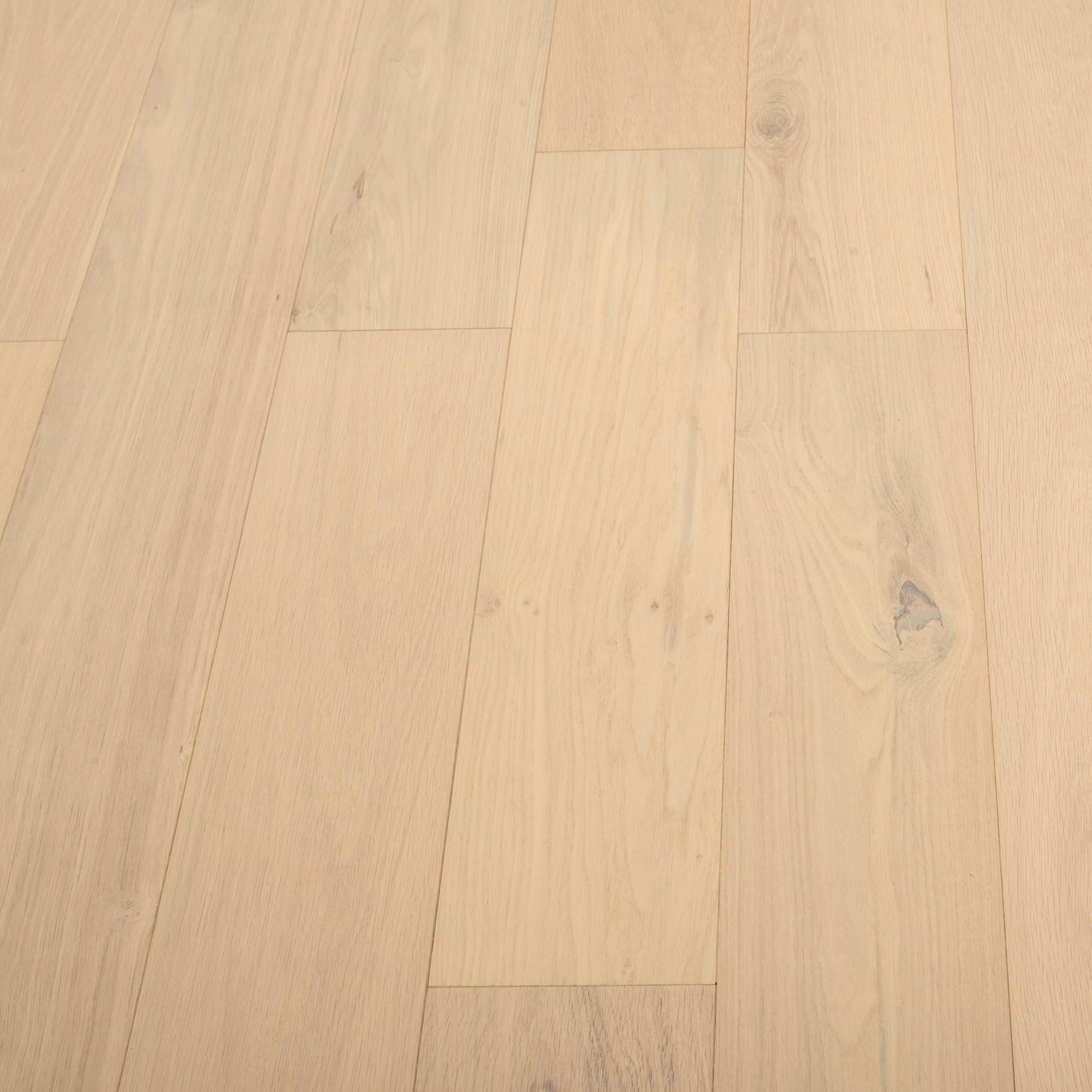 Close-up of a wooden floor with light brown planks