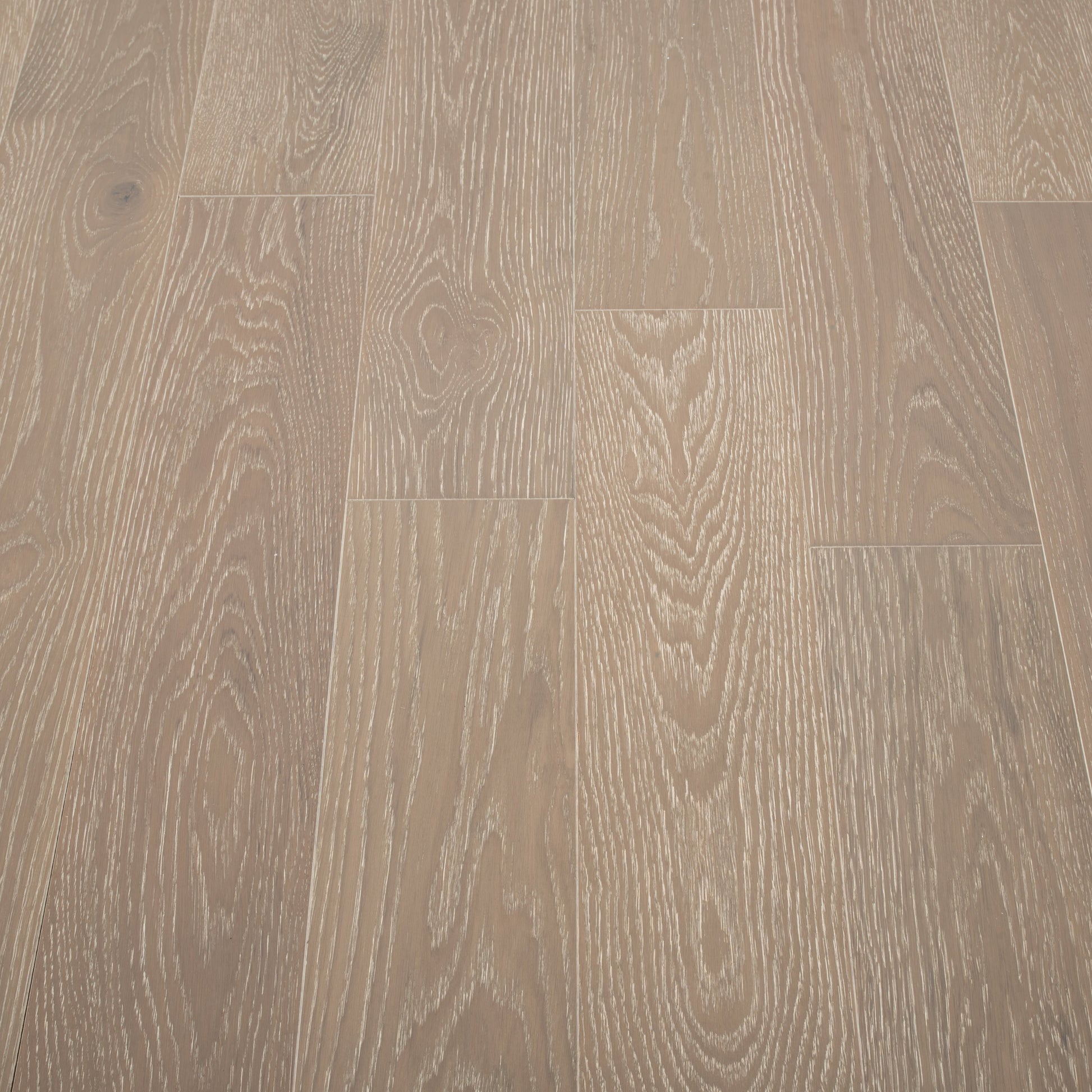 Close-up of wooden flooring with a brown and beige color scheme