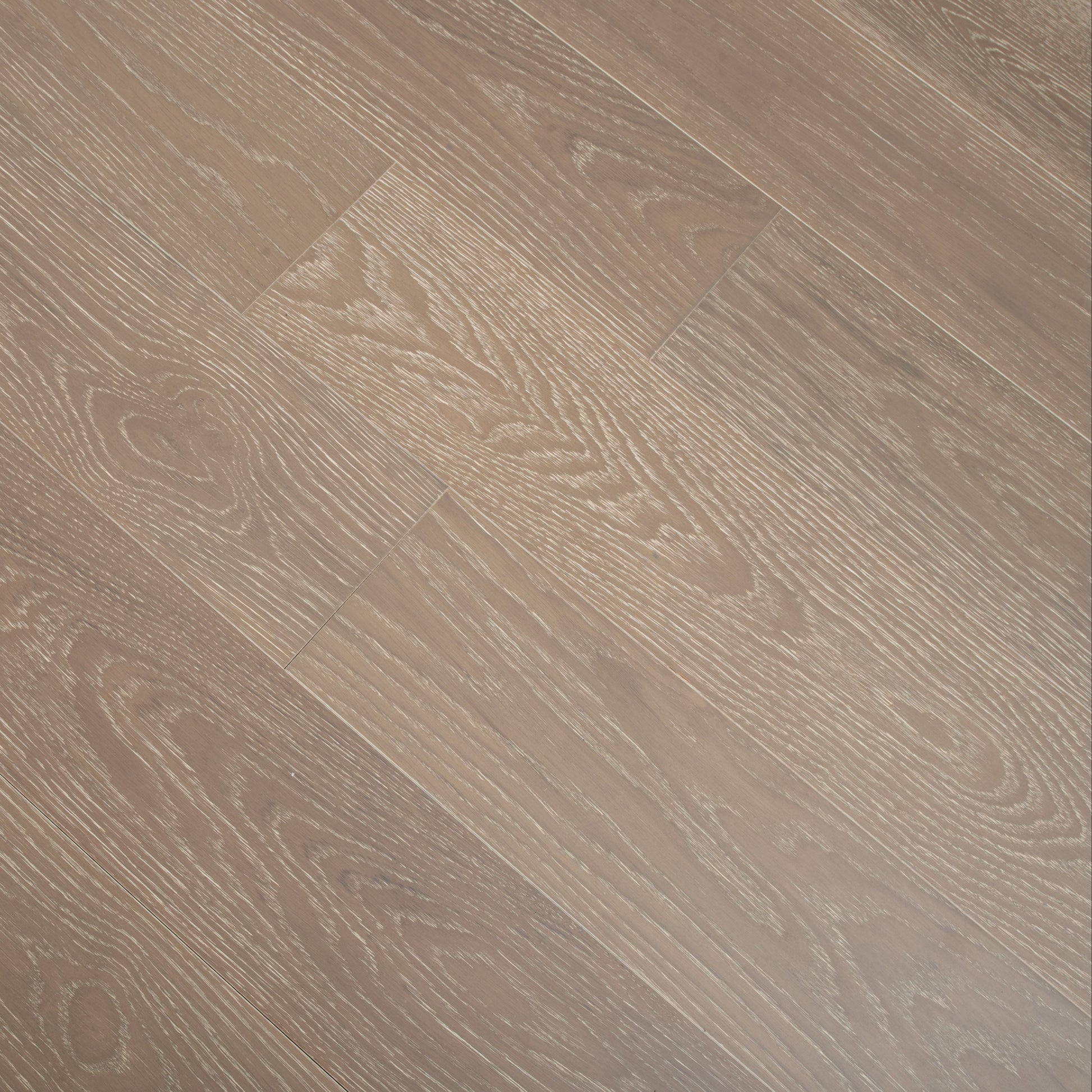 Close-up of a wooden floor with a brown and beige color scheme.