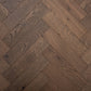 Dark wooden floor with herringbone pattern