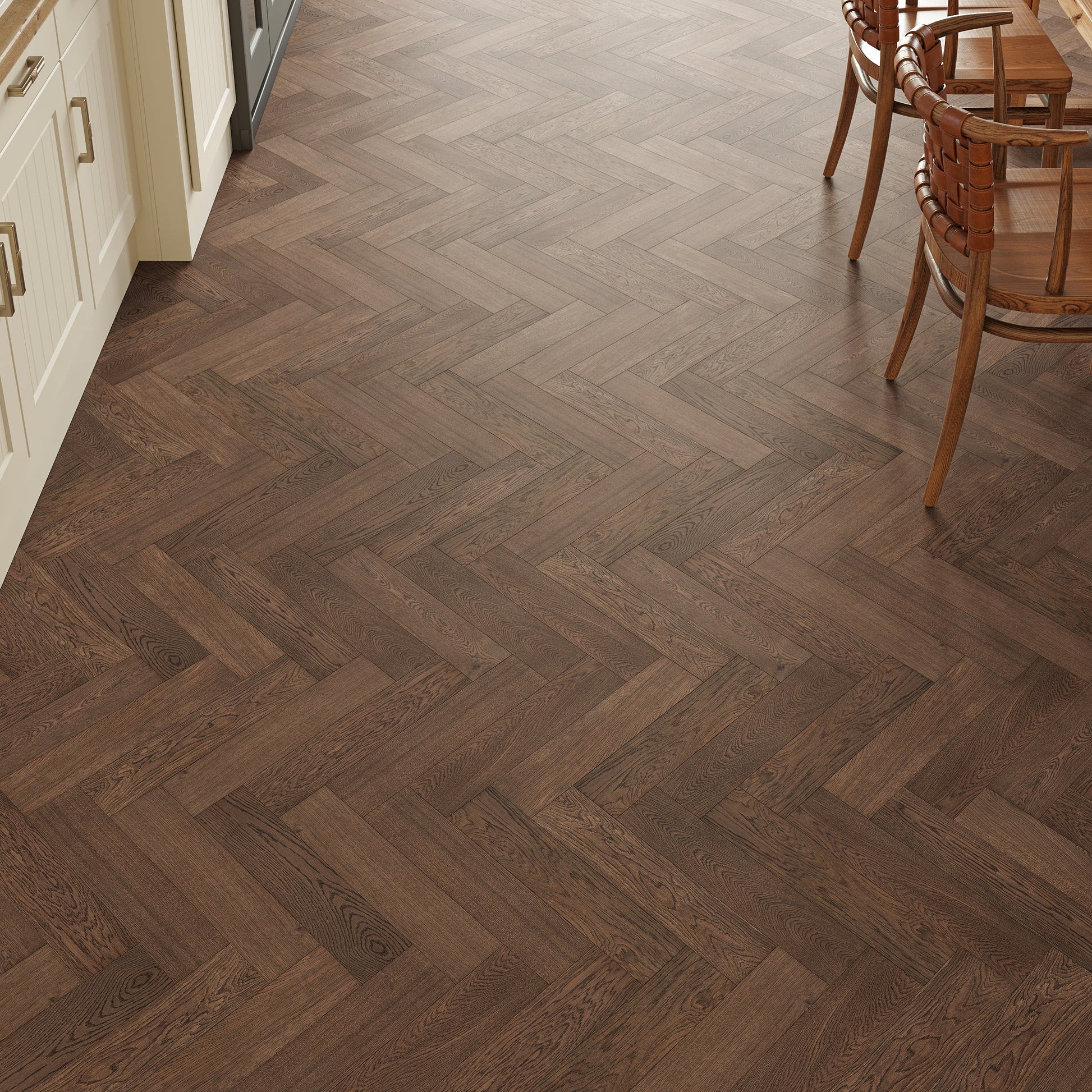 Wooden floor with herringbone pattern in a kitchen setting
