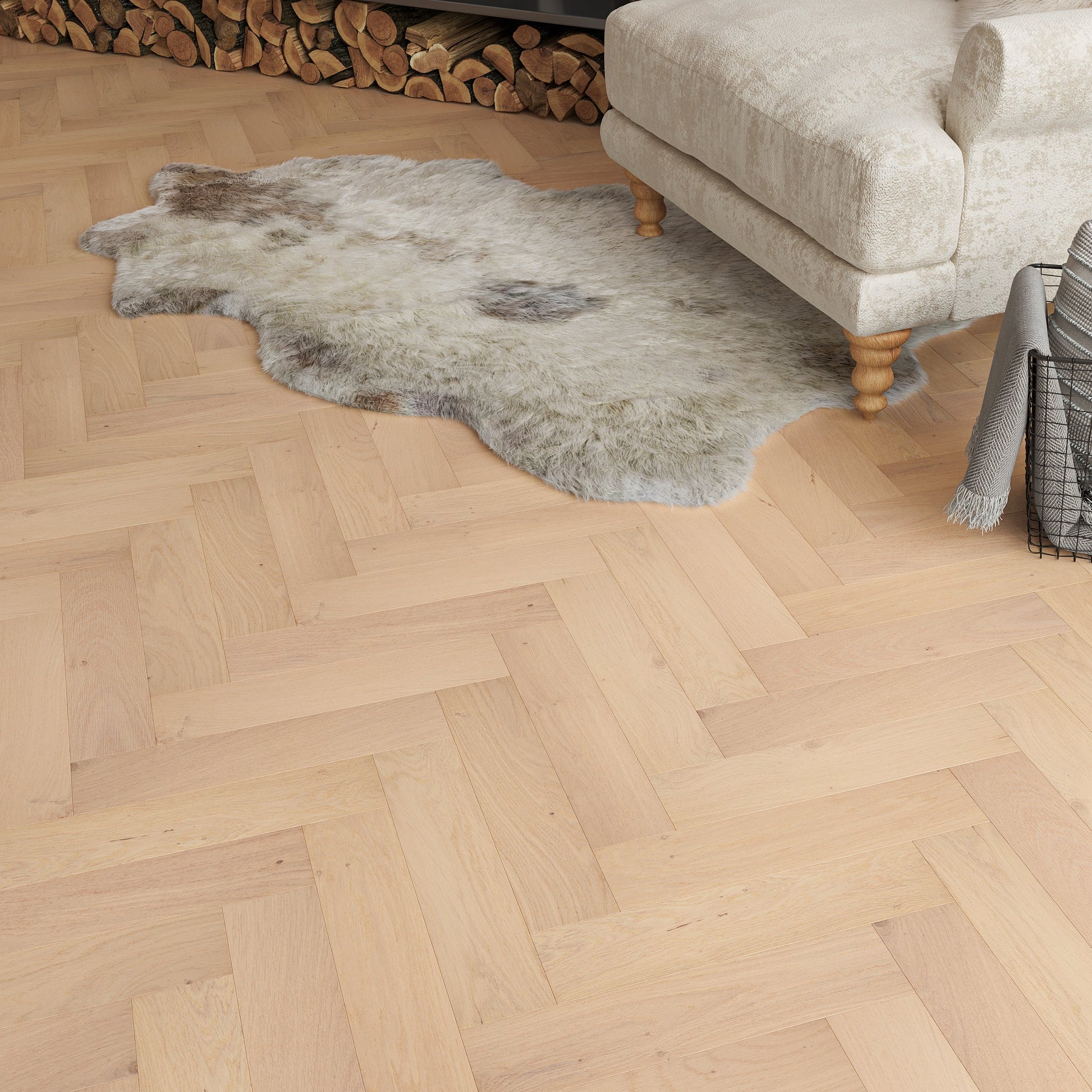 Wooden parquet floor with a cowhide rug and a beige armchair in the background.